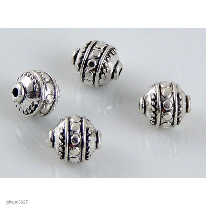 Silver-plated zinc alloy, Bali-styled beads.  Each bead measures 10mm end-to-end.