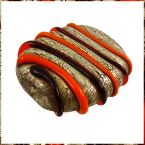 Handmade Glass Lampwork Bead: Orange Swirls on Distressed Silver Leaf