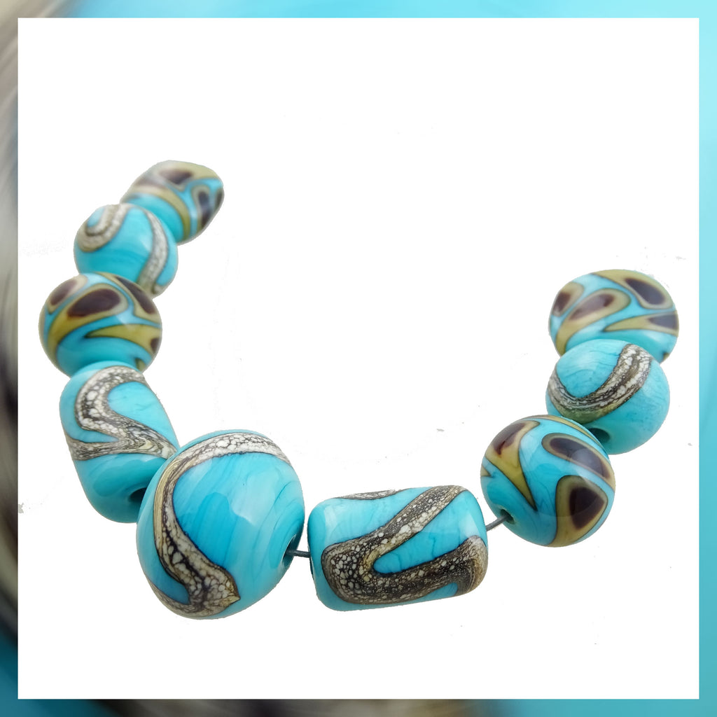 Handmade Glass Bead Set: 9 Lampwork Beads (Turquoise, Ivory, Tan & Dark Amber)