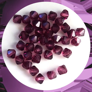 Swarovski 5328 Xilion Beads: 4mm Bi-cone / Pack of 40 / Amethyst