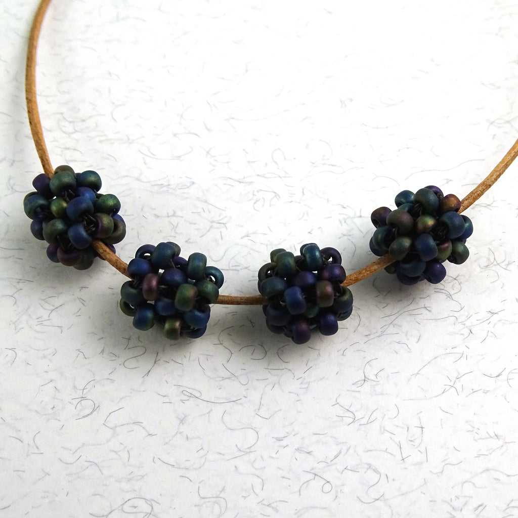 "Cage Beads": Hand-Woven Beaded Beads - Matte Black Iridescent