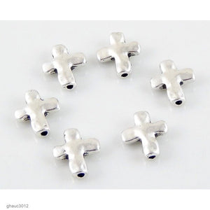 High quality Zinc alloy "Zamak" beads with silver-plated finish.  Each bead measures 13mm end-to-end.