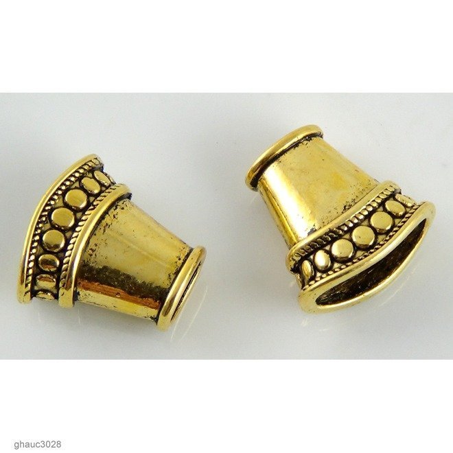 Antique-brass plated zinc alloy, Bali-style cones.  Each bead measures 13mm end-to-end.