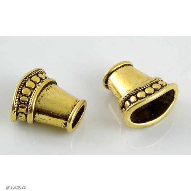 Antique-brass plated zinc alloy, Bali-style cones.  Each bead measures 13mm end-to-end.