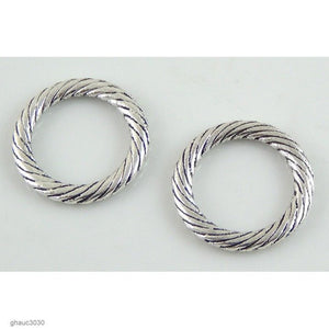 Antique-silver plated zinc alloy link.  Each bead measures 24mm end-to-end.