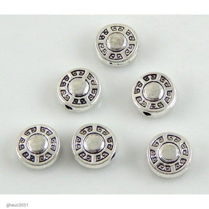 Antique-silver plated zinc alloy, Bali-style beads.  Each bead measures 9mm end-to-end.