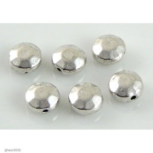 Antique-silver plated zinc alloy, Bali/Thai style beads.  Each bead measures 7mm end-to-end.