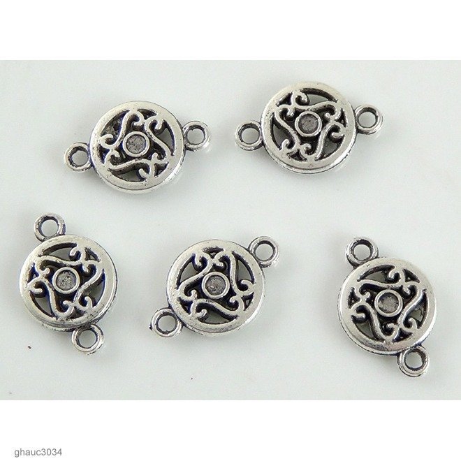Antique-silver plated zinc alloy, Bali-Thai style links  Each bead measures 19mm end-to-end.
