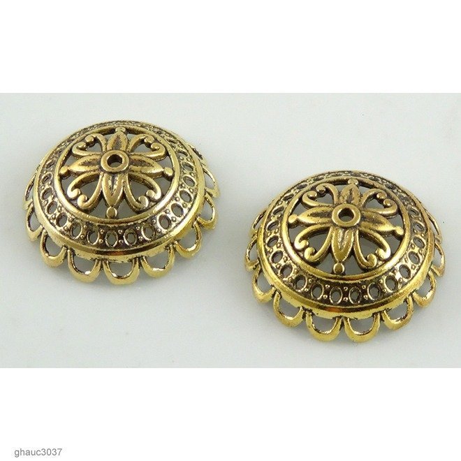 Antique-brass plated zinc alloy filigree bead caps.  Each bead measures 24mm end-to-end.