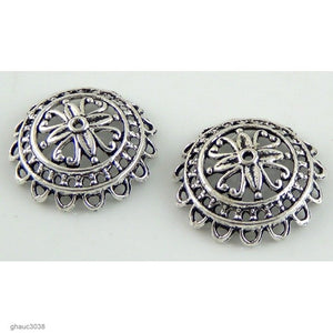 Antique-silver plated zinc alloy filigree bead caps.  Each bead measures 24mm end-to-end.