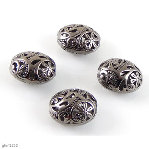 High quality Zinc alloy "Zamak" filigree beads. Galvanized hematite finish.  Each bead is 20mm end-to-end.