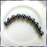 Swarovski Crystal Pearls: 6mm / Iris. Purple / Bag of 10 Pieces (5810)